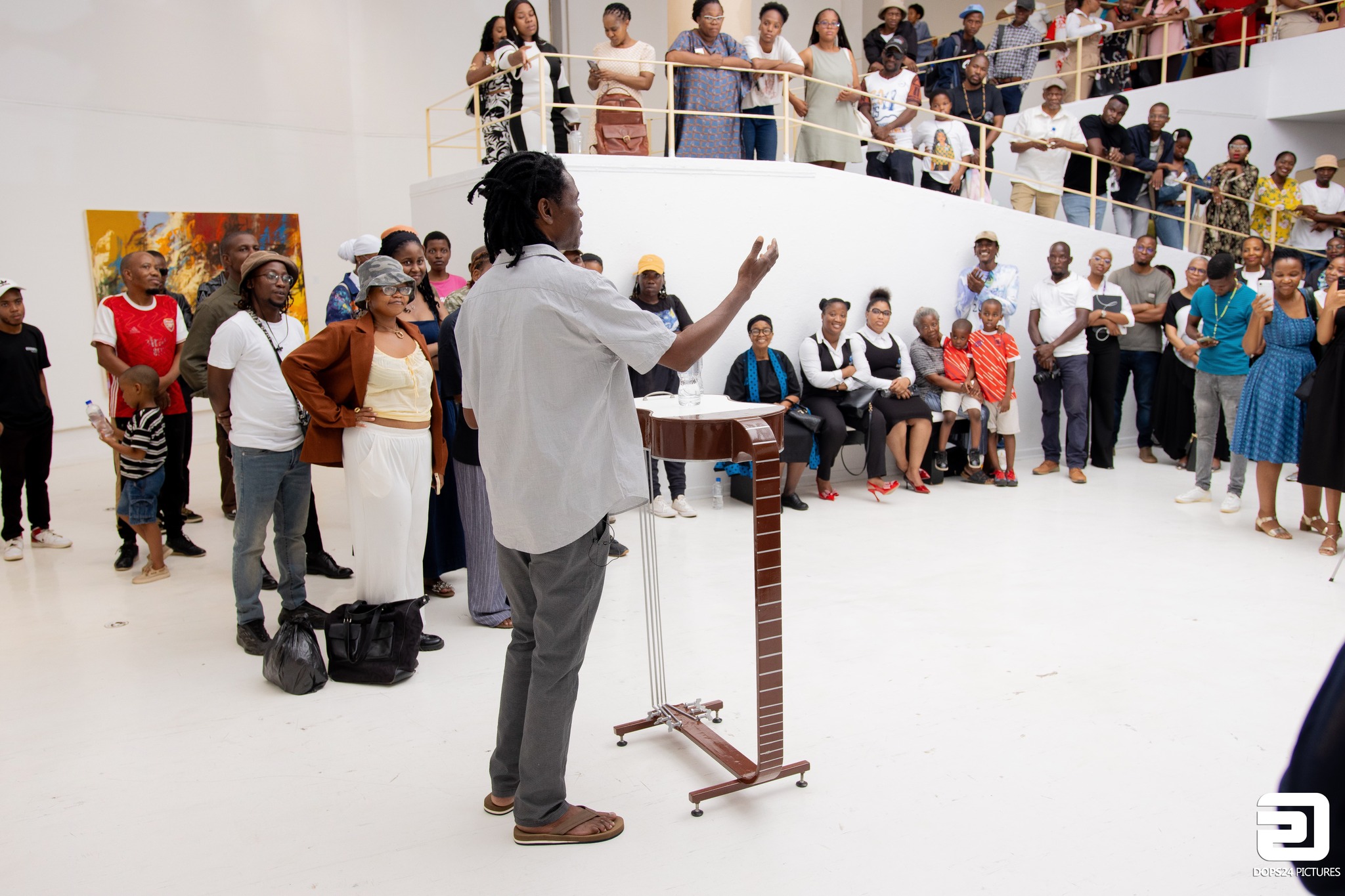 Wilson Ngoni speaking at a private viewing for his solo exhibition I at the National Museum and Art Gallery in Gaborone